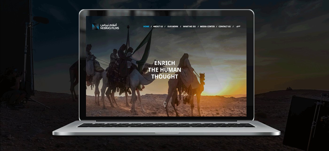 Nebras Films startsida på en laptop: kamelryttare i öknen i solnedgången och raden “Enrich the human thought”